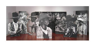Large black and white cutouts of various prints of people in cowboy attire